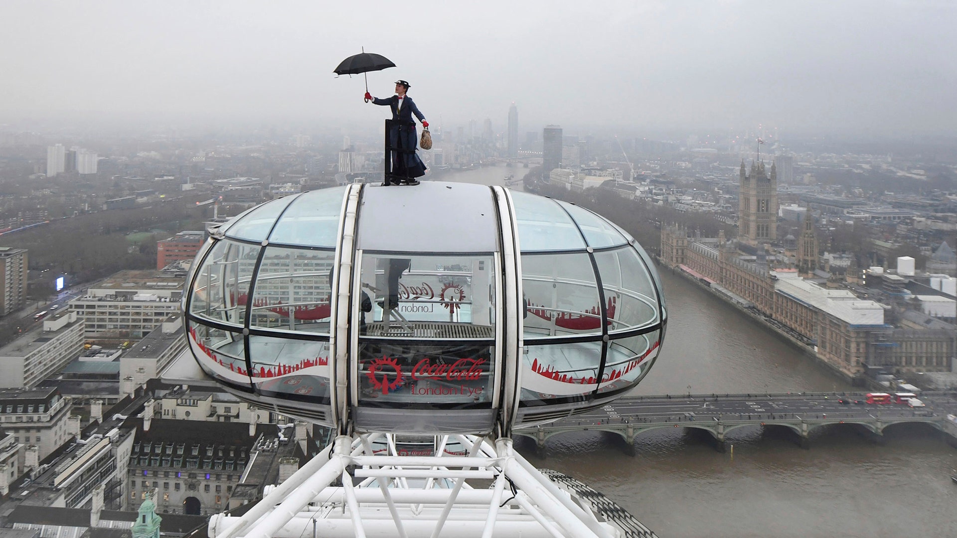Ahead of the European movie premiere of Mary Poppins Returns, a Mary Poppins stunt double rides atop of the London Eye in central London, Dec. 12, 2018. 