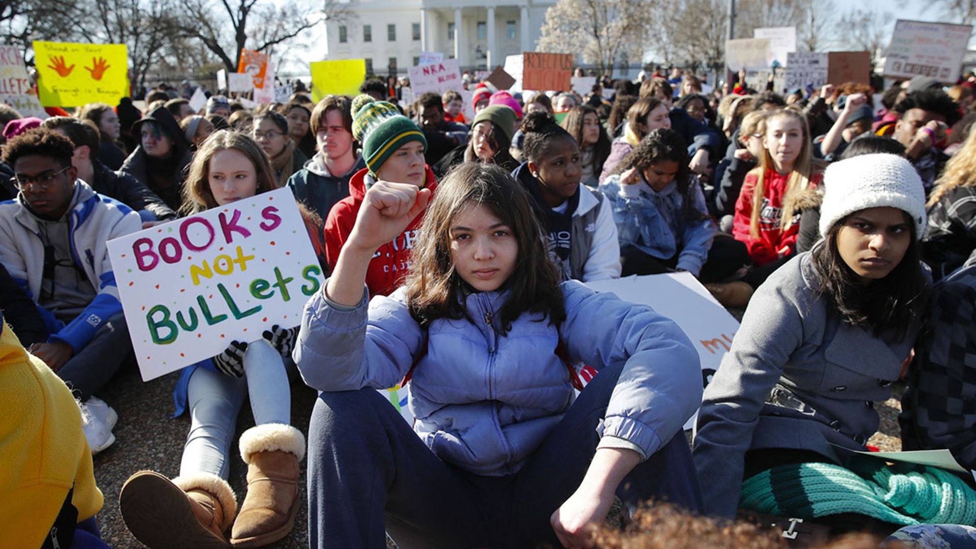 Students rally in front of the White House after walking out of school to protest gun violence in Washington, March 14, 2018. 