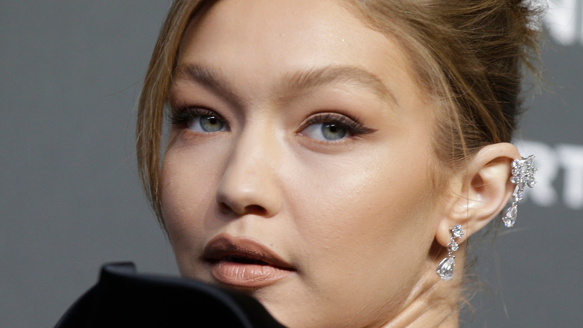 Model Gigi Hadid poses on the red carpet on the occasion of the 2019 Pirelli Calendar event in Milan, Italy, Dec. 5, 2018. 