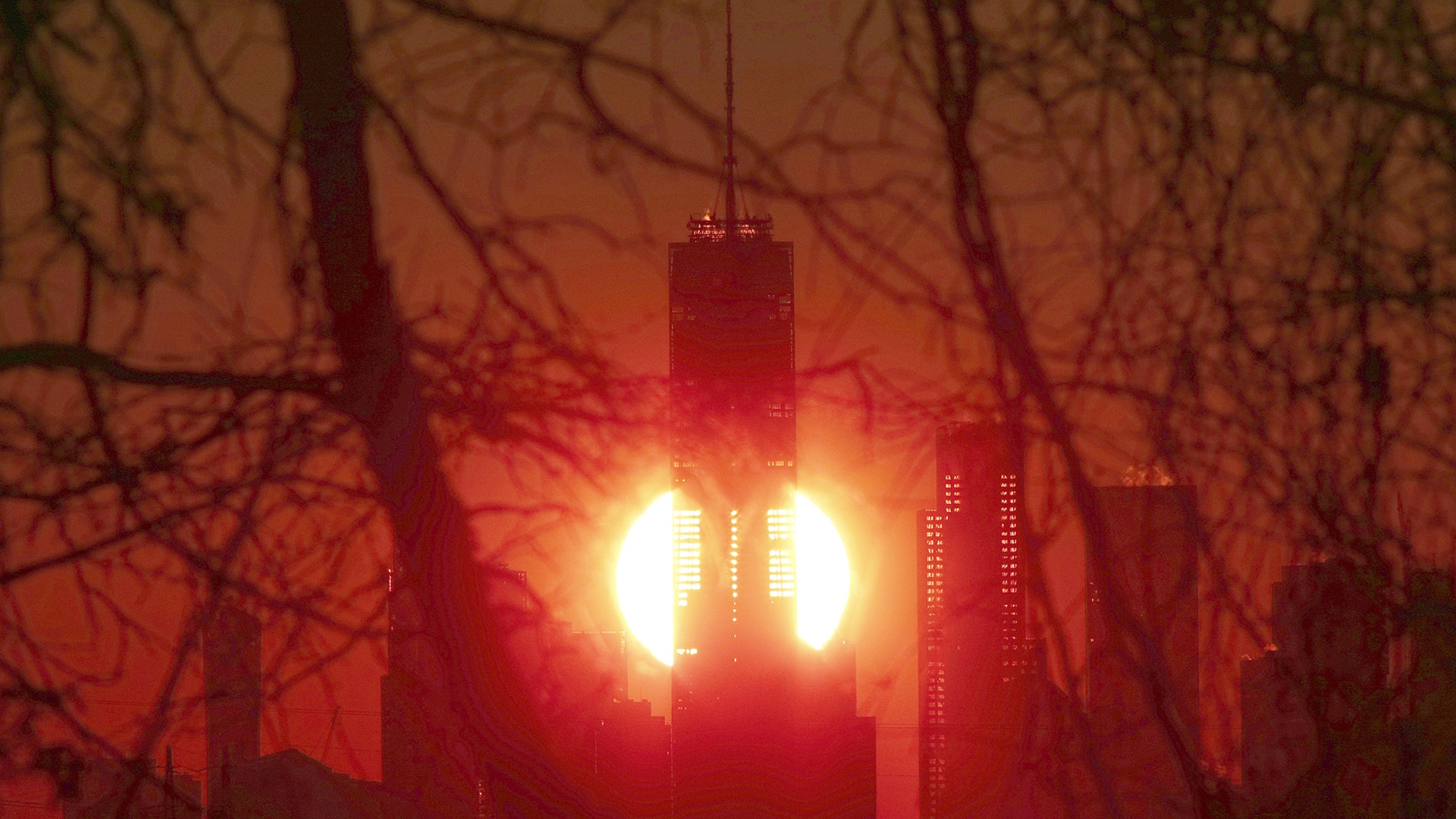 The rising sun illuminates the interior of One World Trade Center in New York City, Dec. 8, 2018.
