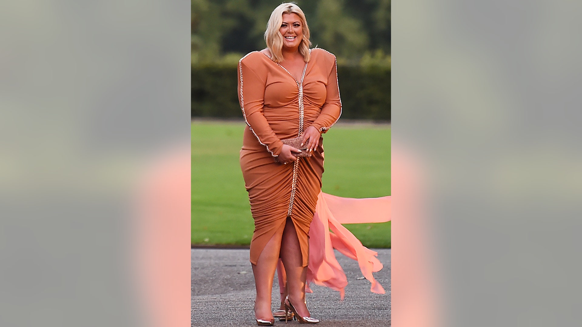 What is Gemma Collins wearing? The British reality star donned a strange orange dress with large shoulder pads as she left the ITV Summer Party. PHOTOS: Worst celebrity wardrobe malfunctions