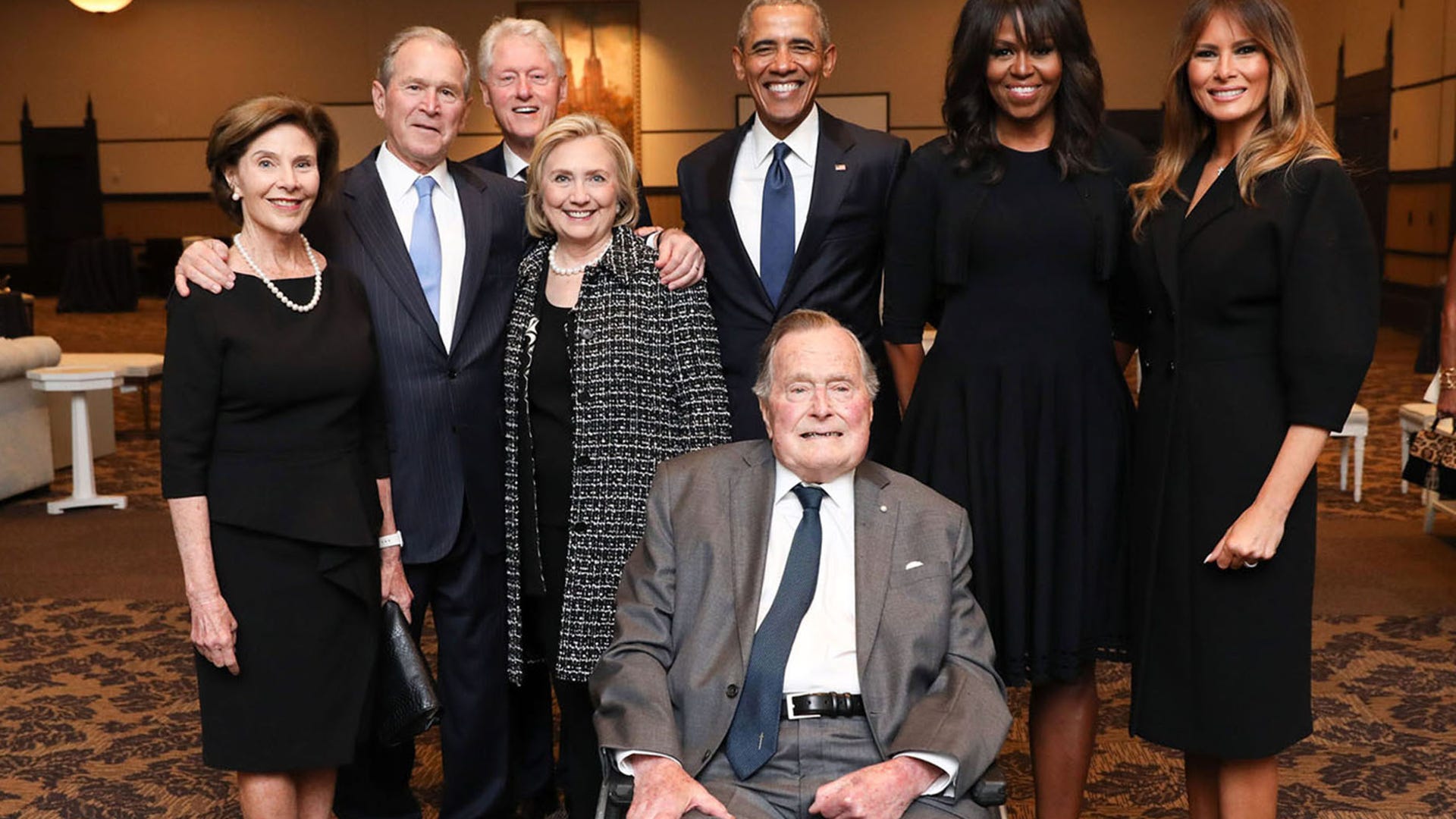 Former first lady Laura Bush, former President George W. Bush, former President Bill Clinton, former Secretary of State and first lady Hilary Clinton, former President Barack Obama, former President George H. W. Bush, former first lady Michelle Obama and current first lady Melania Trump pose for a group photo at the funeral for Barbara Bush in Houston, April 21, 2018. 