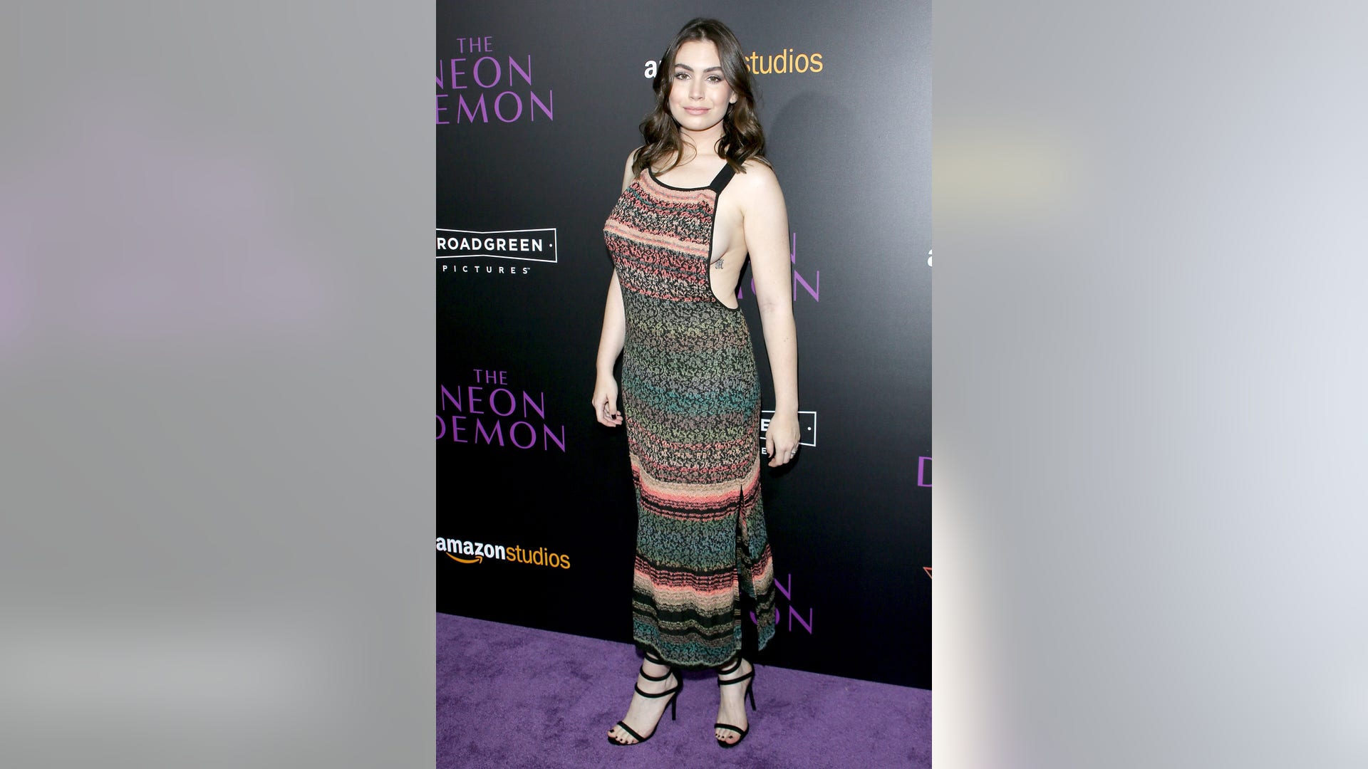 Gene Simmons' little girl is all grown up! Sophie Tweed Simmons wore a revealing dress to the Los Angeles premiere of "The Neon Demon." Click here to see more of what the stars are up to.