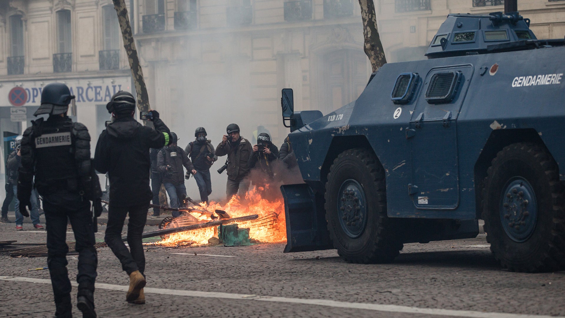 Fires breakout in clashes between police and protesters, during demonstration of the "Yellow vests", in Paris, France, on December 8th 2018.