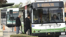Man in wheelchair on bus refuses to move for mother and young daughter