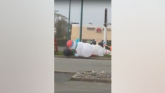 Inflatable snowmen recorded having 'serious brawl' during windstorm