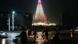 World's tallest empty hotel lit up with N. Korean propaganda
