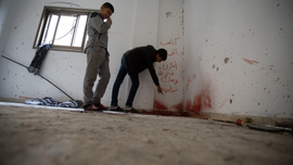 The Latest: Israeli troops seal off Ramallah to find shooter