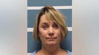 California teacher who sang national anthem while forcibly cutting student's hair is arrested