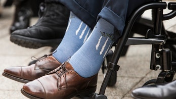 George H.W. Bush mourners pay tribute to the late president with colorful socks