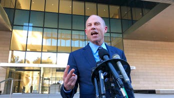 Avenatti to lose cash, artwork, Ferrari in divorce settlement with wife: report