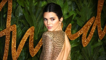 Kendall Jenner channels Pamela Anderson in 'Barb Wire' with plunging corset for Halloween