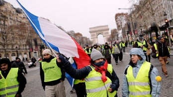 21 detained before Paris protests as police deploy in force