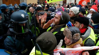 'Yellow vest' protesters take to streets of France for fifth week as Macron appeals for 'order'