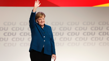 The Latest: Merkel says her party must look to the future