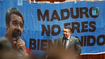 The Latest: Venezuela leader protested at Mexico ceremony