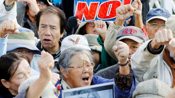 Japan begins reclamation at disputed US base despite protest