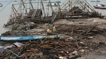 The Latest: Tsunami toll now 429 dead, thousands homeless