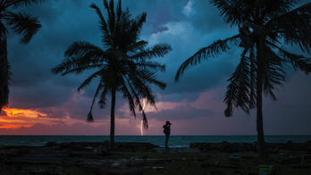 Indonesia asks people to avoid coast near erupting volcano