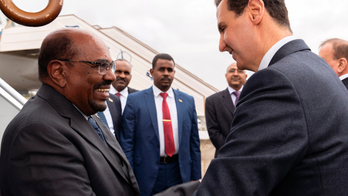 Sudan president lands in Syria in 1st visit by Arab leader