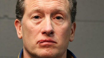 Man tells wife, 'You love those dogs more than you love me,' before throwing pets off balcony, killing one