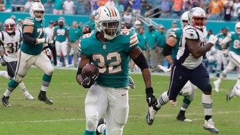 Miami Dolphins' Kenyan Drake wants ball he threw into stands after game-winning TD back