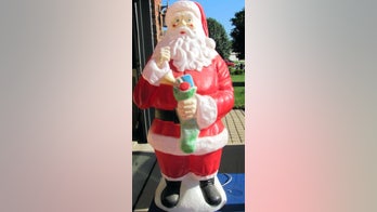 My old, plastic Santa wasn't worth much but he was stolen anyway. Then THIS incredible thing happened