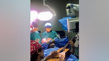 South African musician plays guitar while undergoing brain surgery