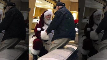 Santa Claus takes a knee to thank World War II veteran in heartwarming viral photo