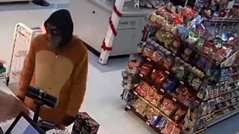 Police hunt masked gunman who wore fleece animal onesie