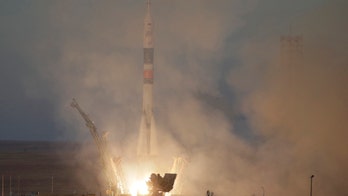 Soyuz rocket launches astronauts to the International Space Station