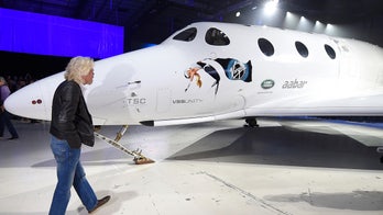 Branson says Virgin Galactic will send people to space before Christmas
