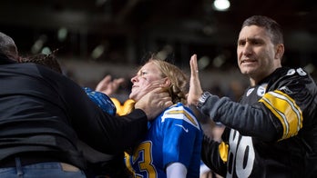 Steelers fan chokes pregnant Chargers fan at game, photos and video show