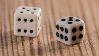 Arkansas election determined by roll of dice after tie