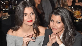 Kourtney Kardashian and Kendall Jenner sizzle in cheeky poolside bikini pic