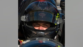 Racecar driver must pay $1.3 billion award in payday loan suit