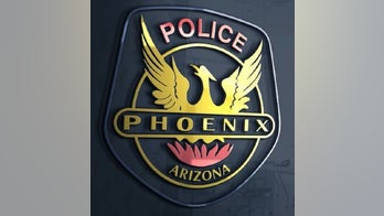 Suspect grappling with Phoenix police officer is shot, killed by assisting officer, police say