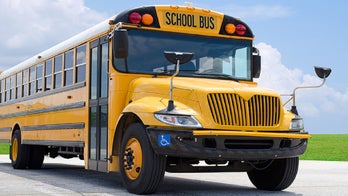 2 dead when wrong-way truck hits bus carrying Illinois girls basketball team