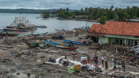 The Latest: Searchers look for victims; tsunami toll now 280