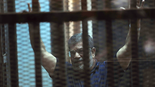 Egypt 's 2 ex-presidents appear in the same courtroom