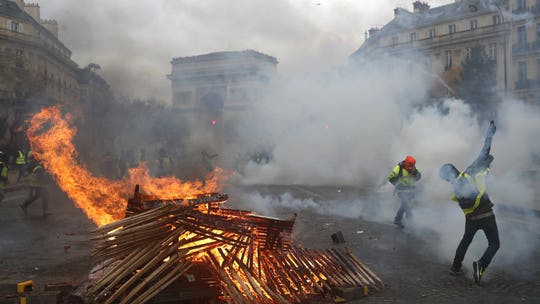 Angry French protesters turn violent for third straight weekend, at least 107 arrested