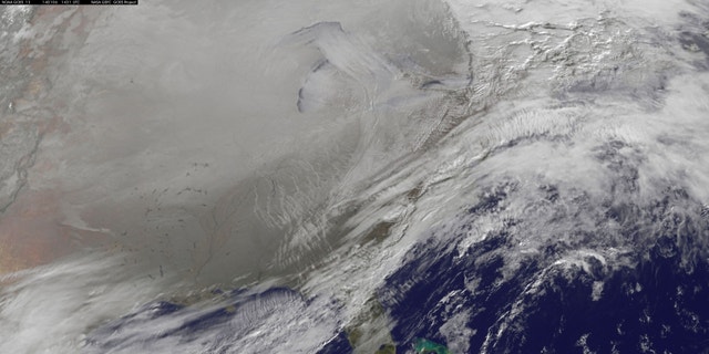 This Jan. 6, 2014 photo shows a satellite image of a polar vortex pushing southward over the U.S.