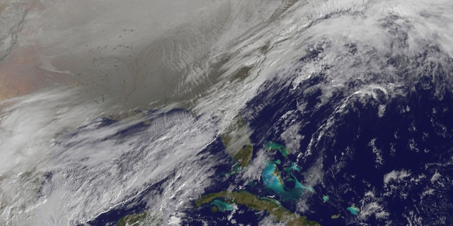 This Jan. 6, 2014 photo shows a satellite image of a polar vortex pushing southward over the U.S.