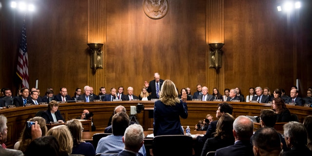 Christine Blasey Ford was sworn in by Senate Judiciary Committee Chairman Chuck Grassley (Republican, Iowa) at the start of her testimony on Capitol Hill in Washington on September 27, 2018.