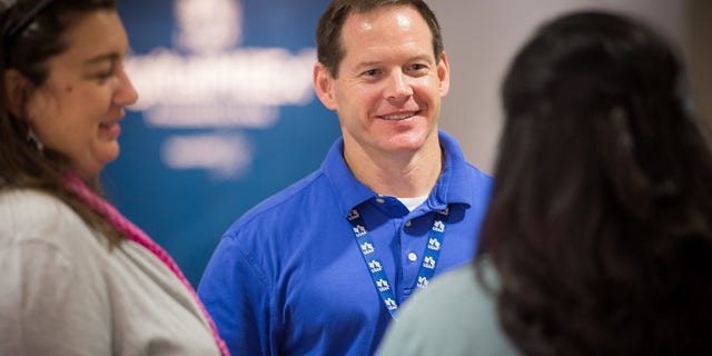 Chad Storlie in center. (Courtesy of USAA)