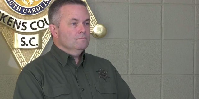 Pickens County Sheriff Rick Clark says the woman who shot and killed the other prison escapee was "a hero" to the department.