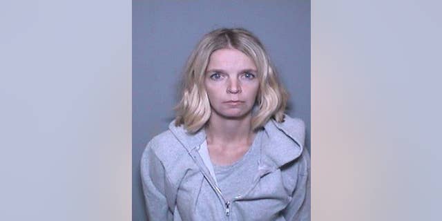 Ashley Bemis, 28, was arrested and charged Tuesday after she allegedly stole from people who believed they were donating to help firefighters battling the California wildfires.