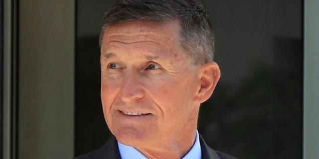 In this July 10, 2018 file photo, former Trump national security adviser Michael Flynn leaves federal courthouse in Washington, following a status hearing.