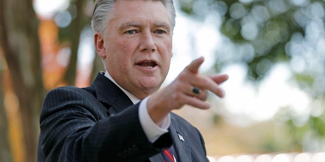 Mark Harris speaks to the media during a news conference in Matthews, N.C.