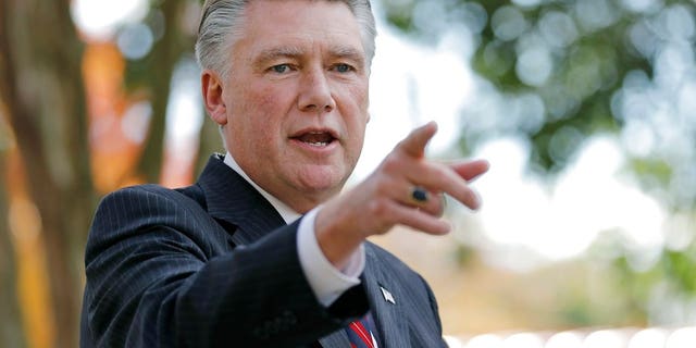 FILE - In this Nov. 7, 2018, file photo, Mark Harris speaks to the media during a news conference in Matthews, N.C. The nation's last unresolved fall congressional race with Harris against Democrat Dan McCready is awash in doubt as North Carolina election investigators concentrate on a rural county where absentee-ballot fraud allegations are so flagrant they've put the Election Day result into question. (AP Photo/Chuck Burton, File)